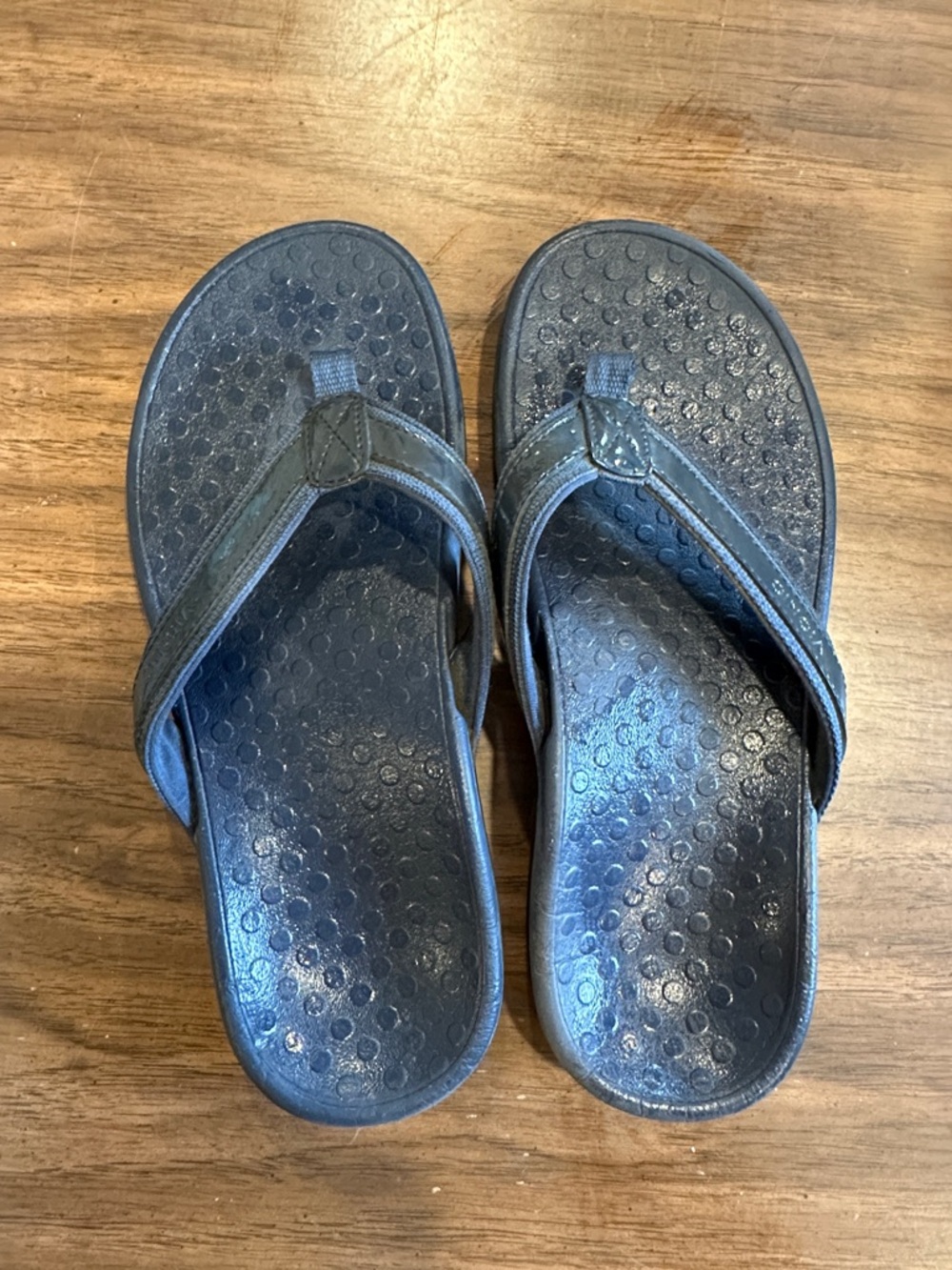 Vionic Navy Blue Flip Flops with Orange Logo Accent